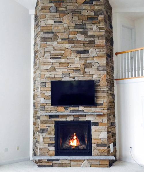 custom stone fireplace surround renovation