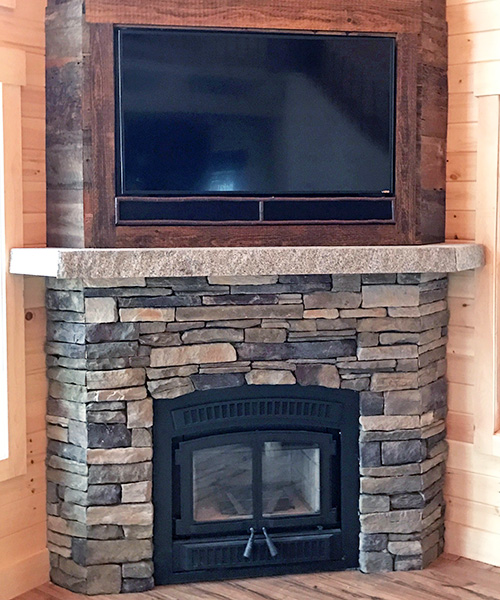 custom stone fireplace surround install in Belmont NH