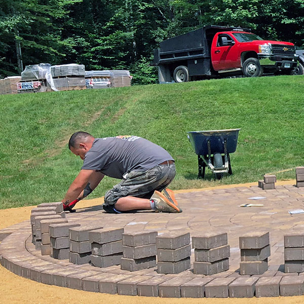 custom stone outdoor fireplace construction