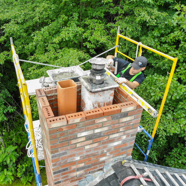Masonry work on a chimney, Meredith, NH