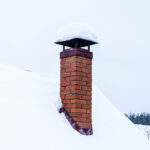 snow and water damages to chimney in Holderness NH