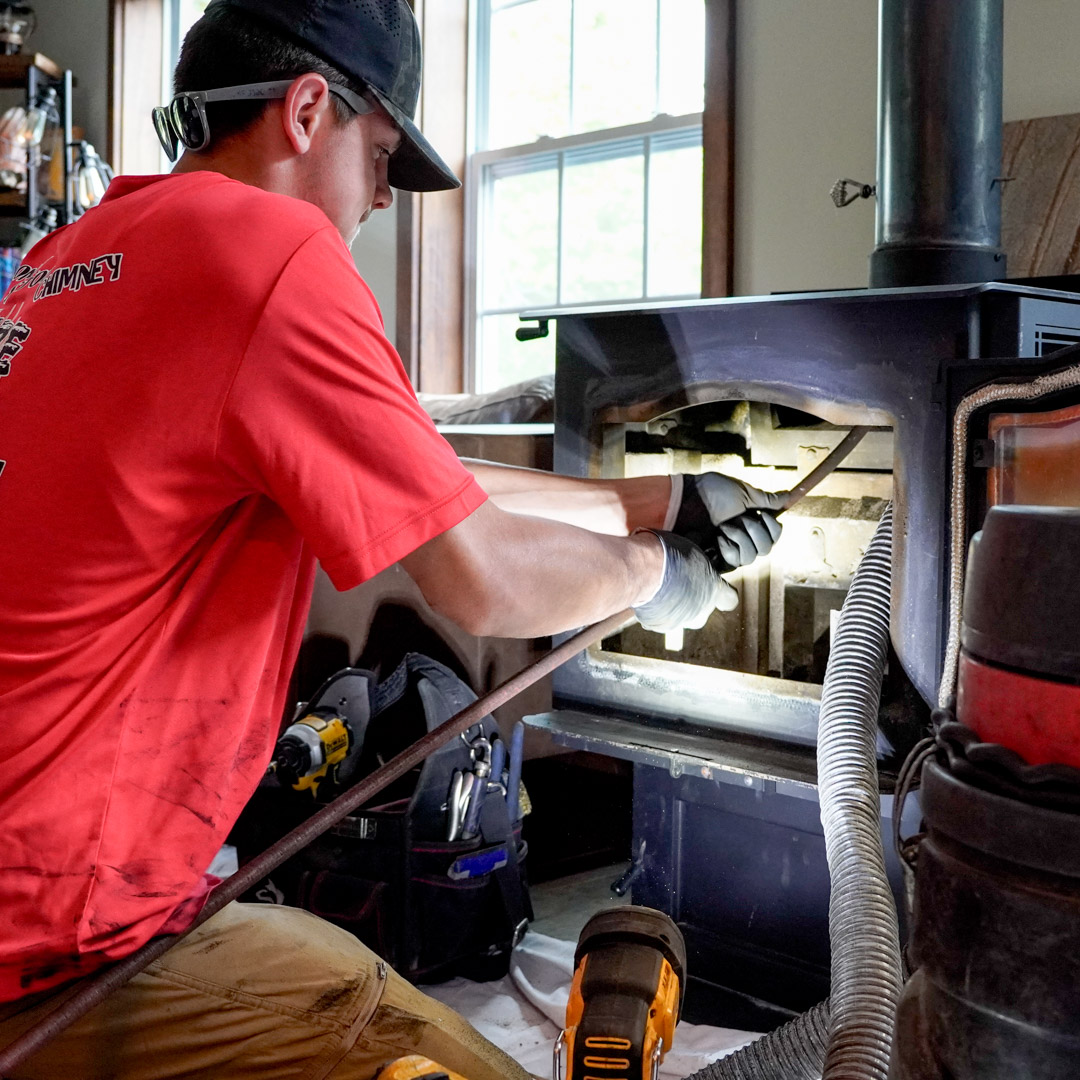 Cleaning fireplace flue in Loudon, NH