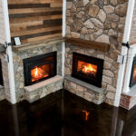 Fire N' Stone of Tilton New Hampshire showroom with dozens of functioning fireplace inserts.